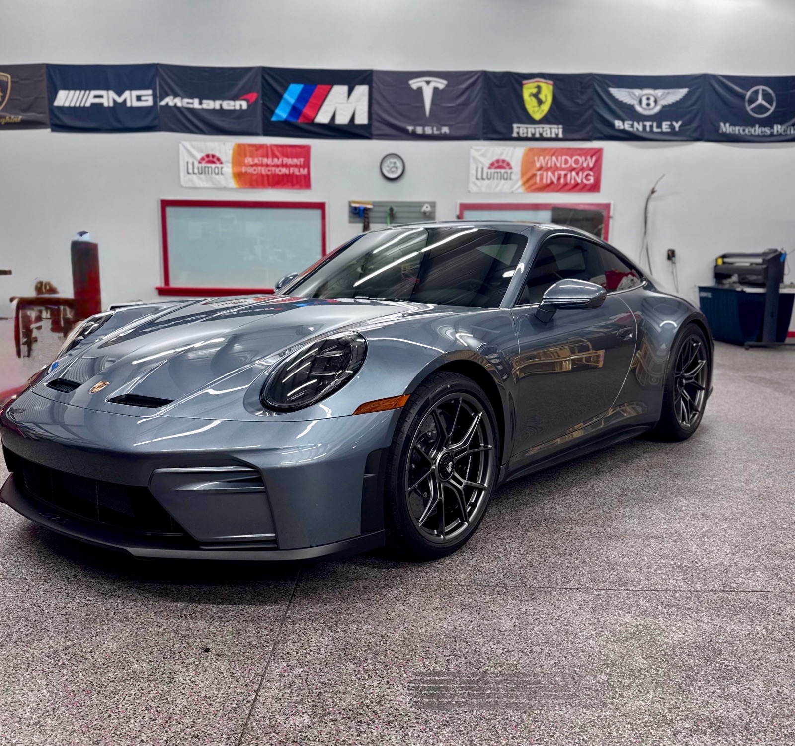 Grey Porsche 911 tinted in the Exzact shop